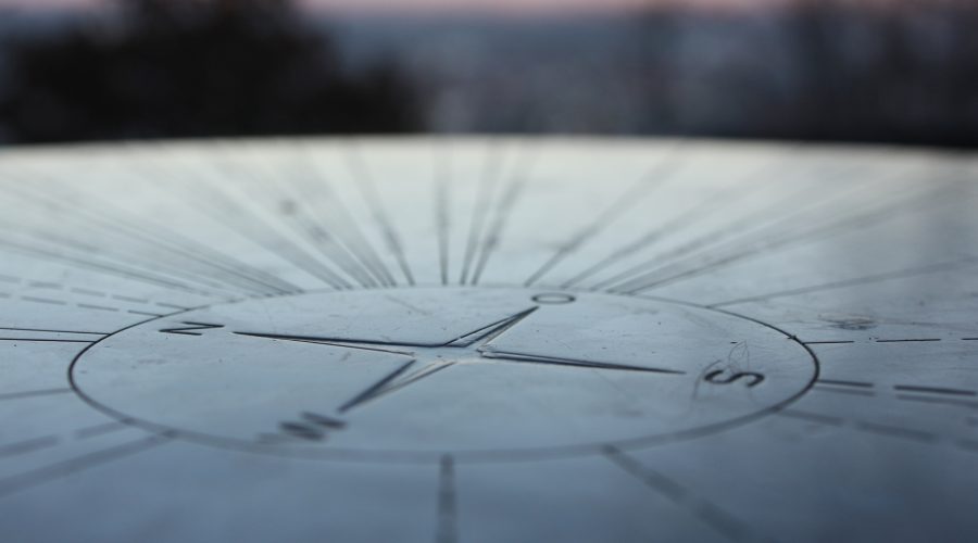 compass etched into stone