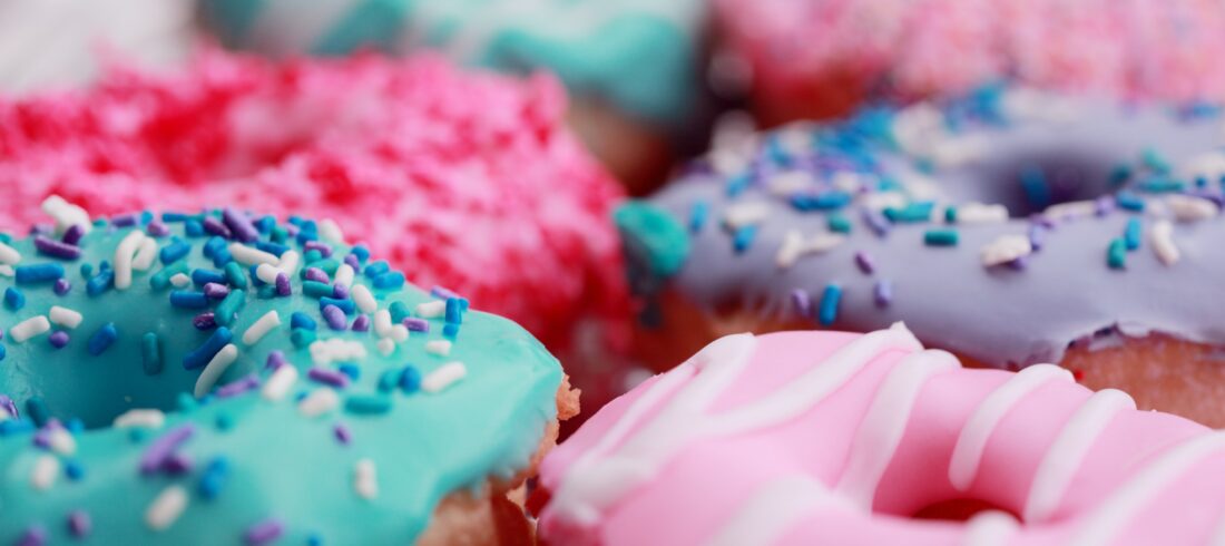 Which color frosting tastes best on a doughnut? Serious question or utter whimsy? Por que no los dos?