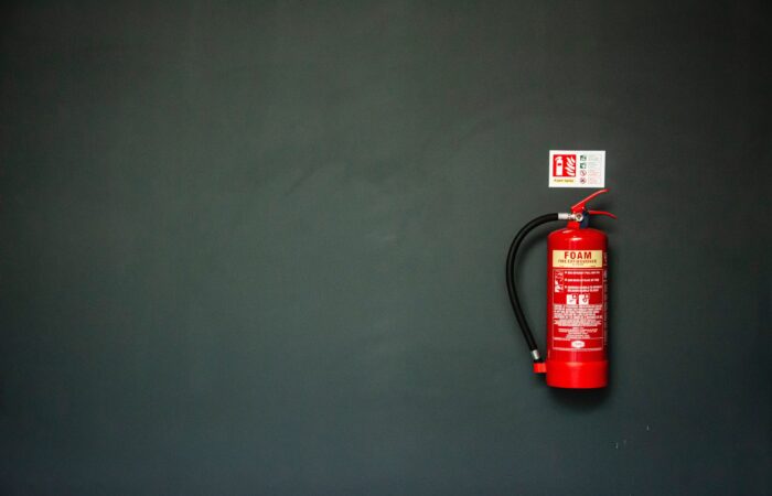 Who determined that the fire extinguisher belonged here? Why?